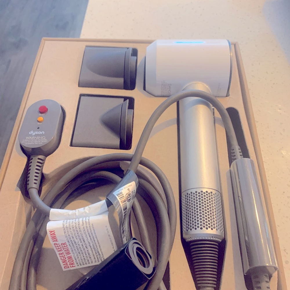 Dyson hair dryer used just a few times still in box